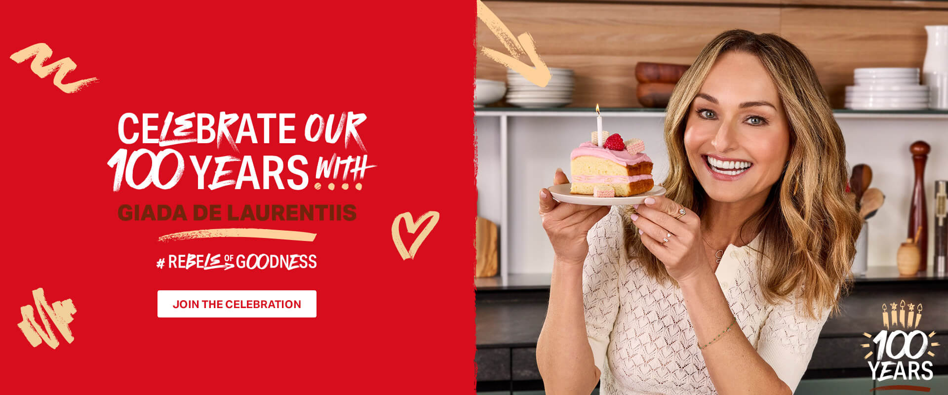 celebrate our 100 years with Giada De Laurentiis #Rebels of goodness; Giada De Laurentiis holding a cake with candle