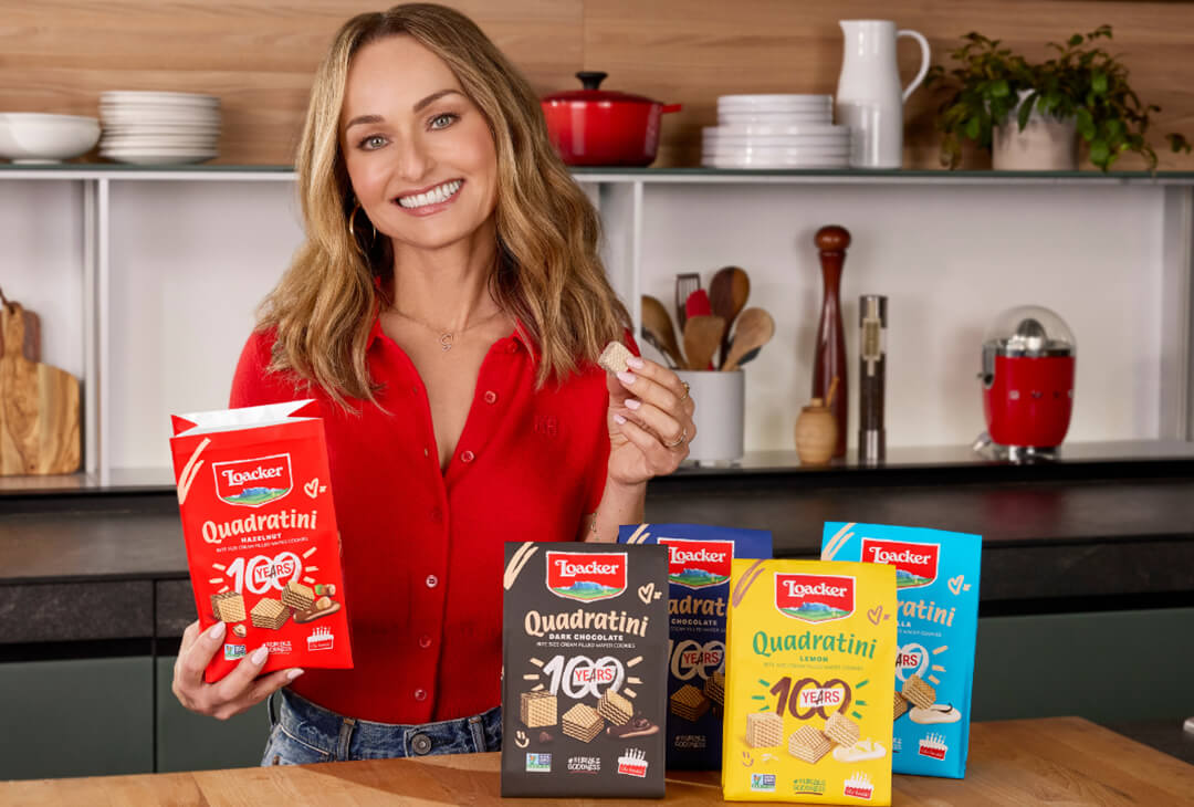 Giada de Laurentiis with various Loacker Quaratini products in the kitchen.