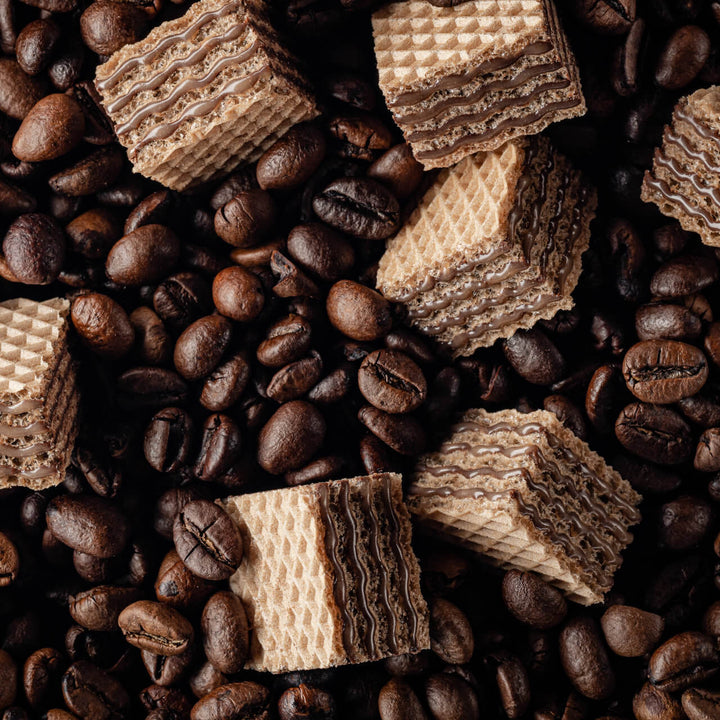 Quadratini Tiramisù, Creme-Filled Wafer Cookies, 7.76 oz. Bag closed up with coffee beans