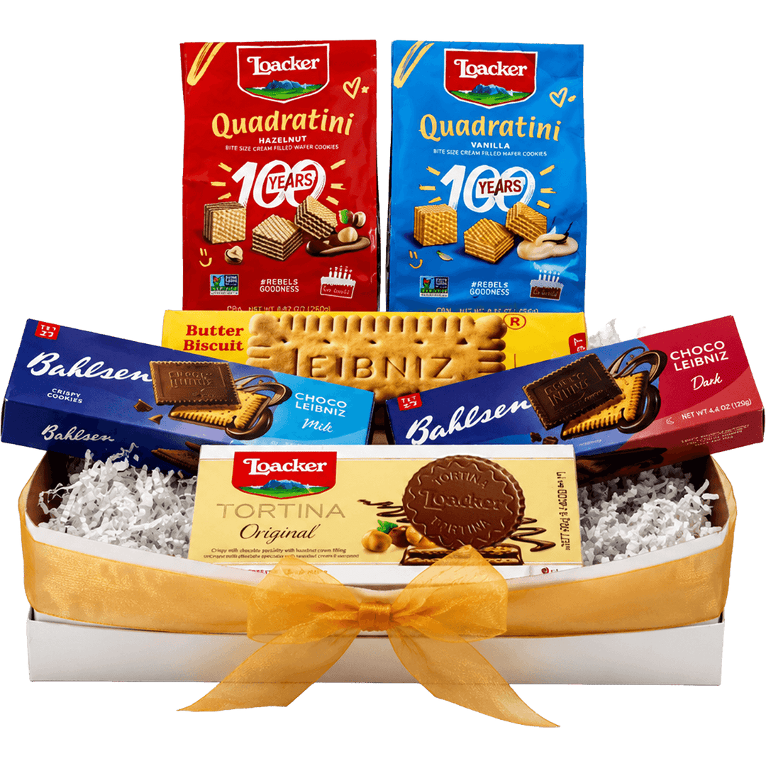 Assorted European cookie and chocolate gift box featuring Loacker Quadratini wafers, Leibniz butter biscuits, Bahlsen Choco Leibniz cookies, and Loacker Tortina chocolates with a gold ribbon.