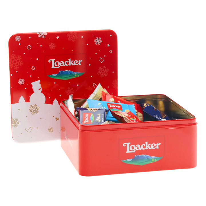 Red Loacker cookie tin with various cookies inside on a white background