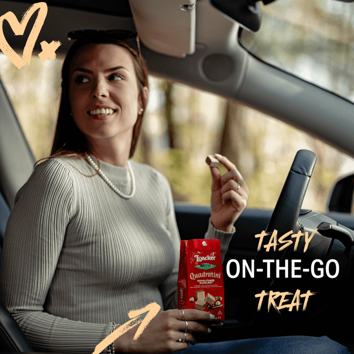 Woman in a car holding a Quadratini snack pack with text 'Tasty On-The-Go Treat' and a logo.