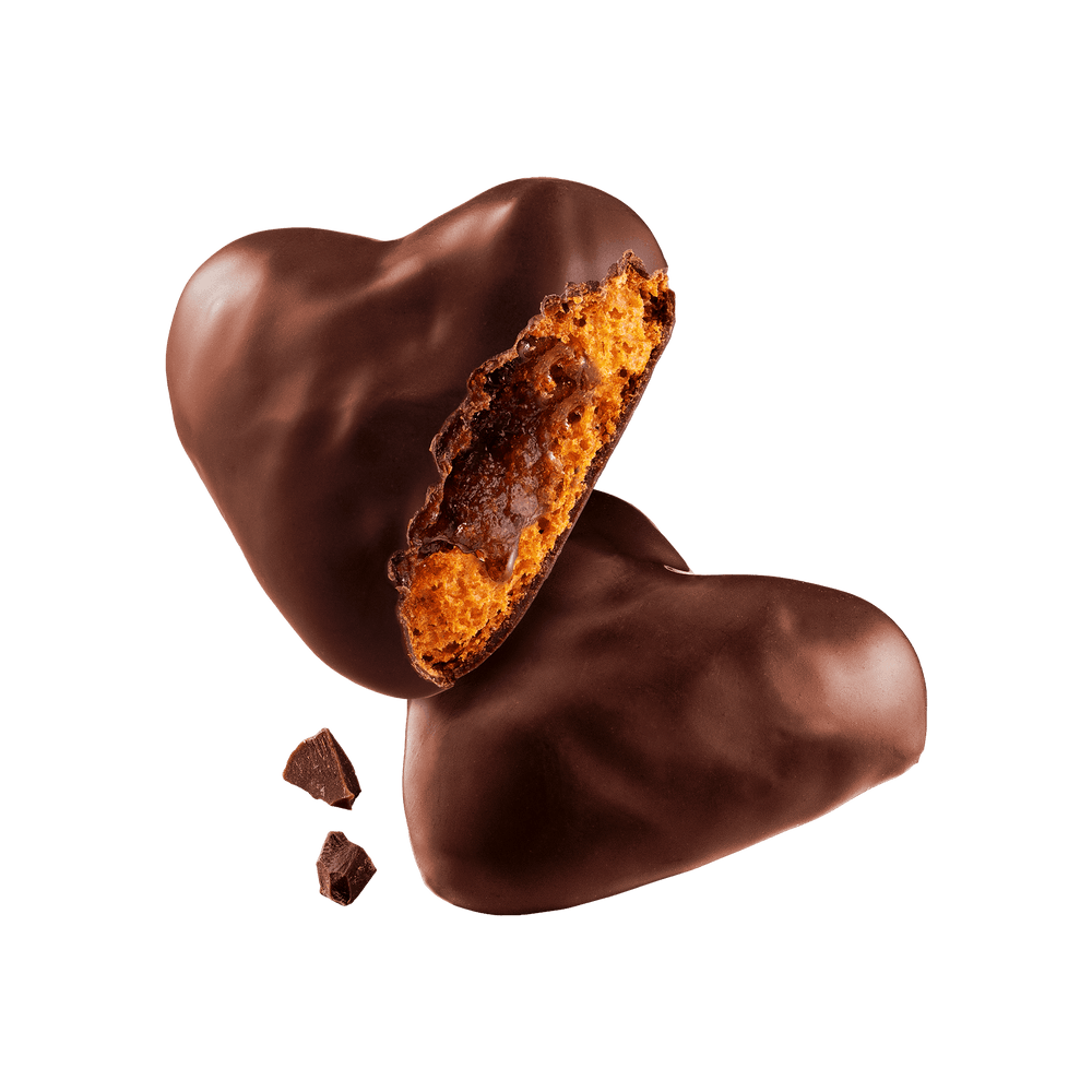 Heart-shaped chocolate candy with a visible filling 