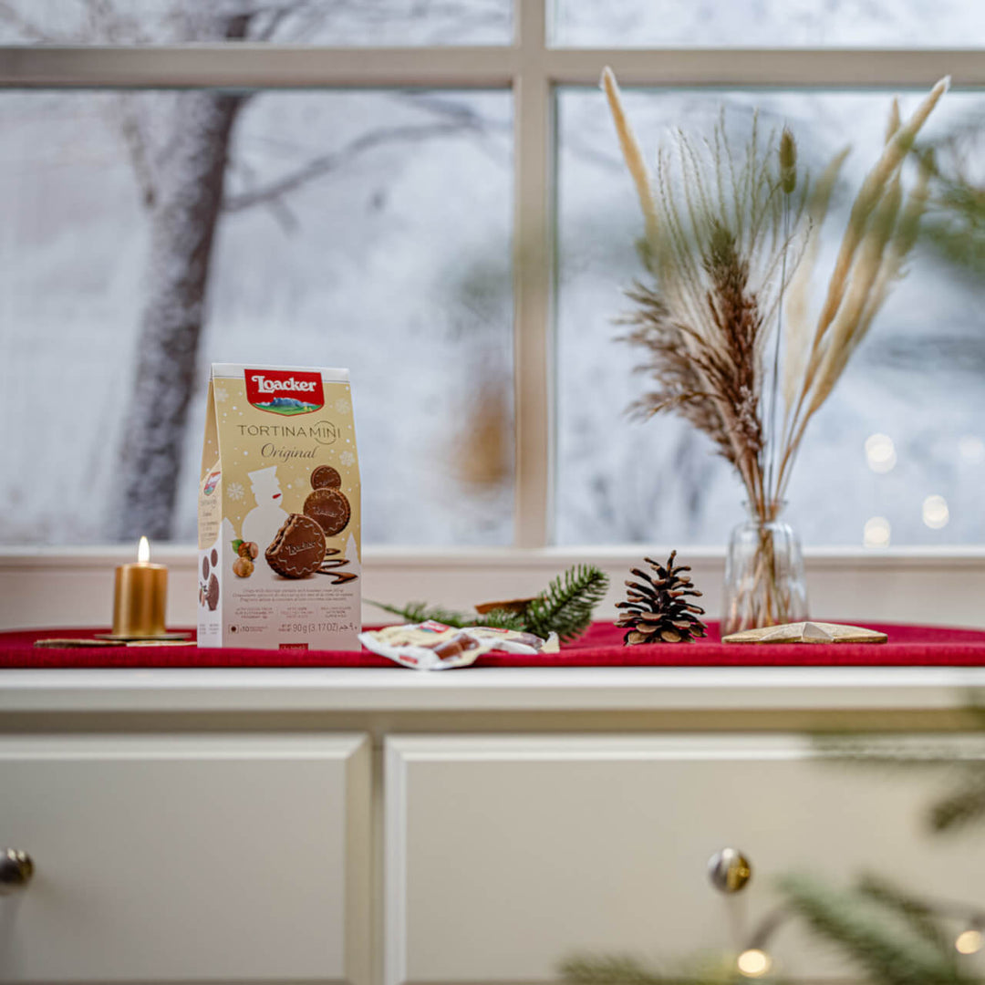 Tortina Mini Original, Chocolate Coated Wafer, 3.17 oz. Holiday Bag with candle, acorn next to it