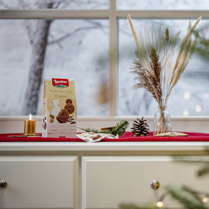 Tortina Mini Original, Chocolate Coated Wafer, 3.17 oz. Holiday Bag with candle, acorn next to it