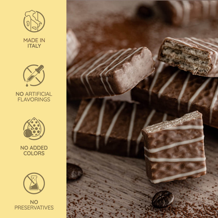 Loacker Patisserie Cappuccino, Chocolate Coated Specialty, 3.53 oz.  Chocolate bars with white drizzle on a wooden surface, accompanied by icons and text about product attributes.