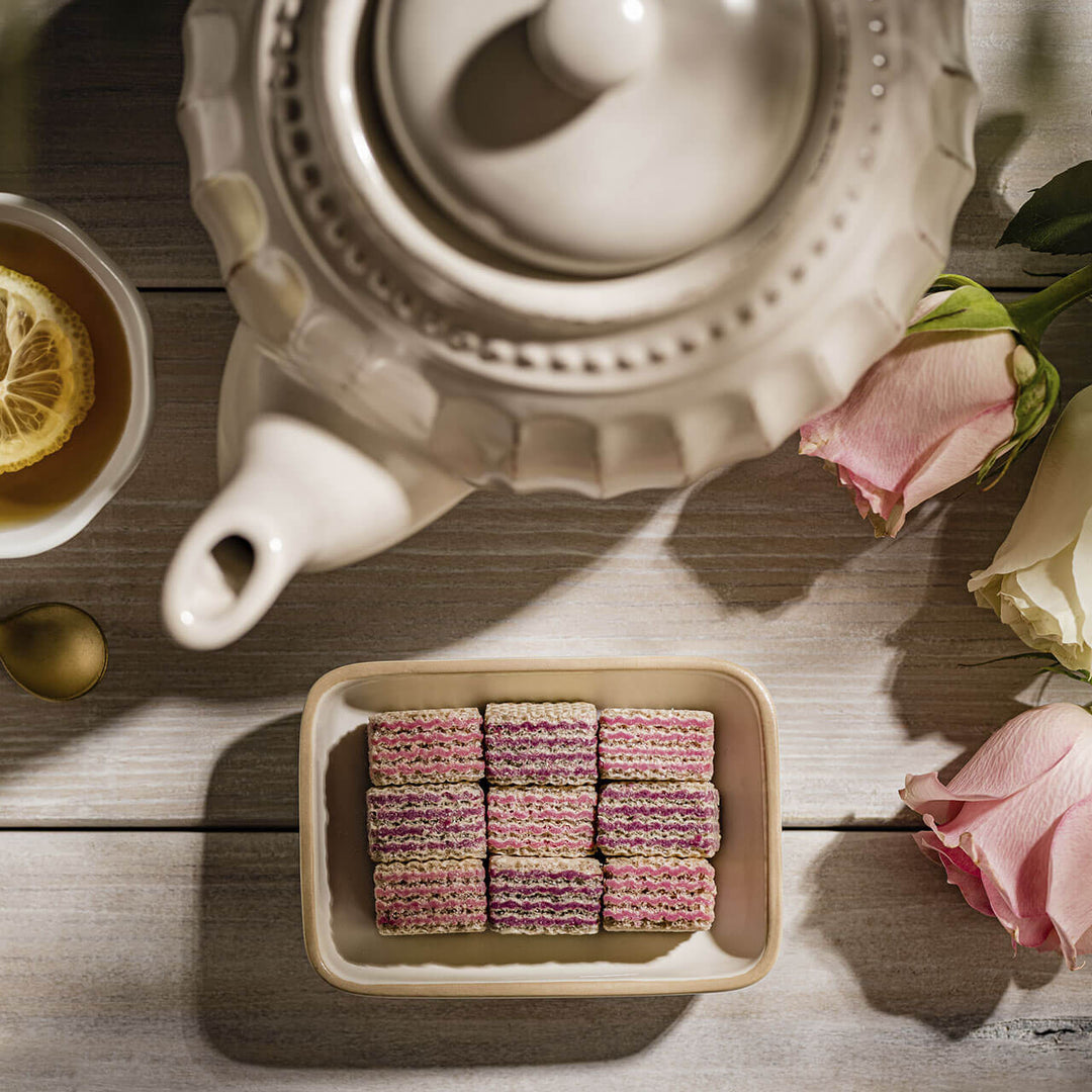 Quadratini Blueberry-Yogurt, Creme-Filled Wafers, 7.76 oz. Bag unwrapped with teapot next to it