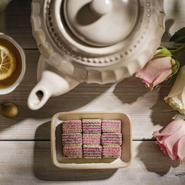 Quadratini Blueberry-Yogurt, Creme-Filled Wafers, 7.76 oz. Bag unwrapped with teapot next to it