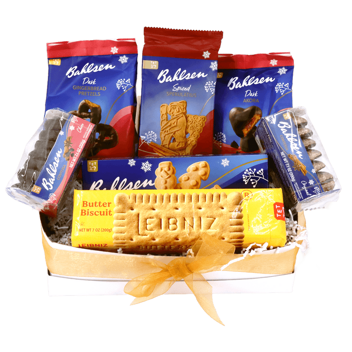 Bahlsen Holiday Collection gift basket featuring assorted German cookies, chocolate-covered gingerbread, spiced Spekulatius, holiday-shaped biscuits, and Leibniz butter biscuits in a gold ribbon gift tray.