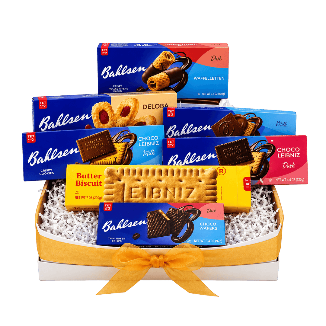 A Bahlsen's Cookie League gift basket filled with assorted chocolate and butter cookies, tied with a yellow ribbon. Visible products include Baksen's Butter Biscuit, Choco Leib niz, Deloba, and Choco Leib niz Dark boxes, arranged in white crinkle paper inside a white basket with a yellow base and yellow ribbon.