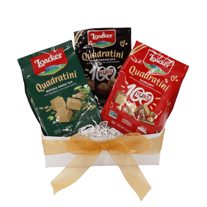 Three Loacker Quadratini cookies packages in different flavors tied together with a ribbon called Lunar New Year Gift Box