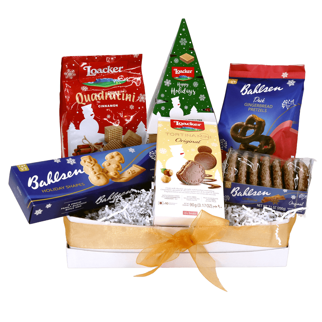 Loacker and Bahlsen holiday gift basket featuring cinnamon wafers, Tortina Mini chocolates, gingerbread pretzels, holiday-shaped cookies, and Contessa gingerbread in a gold ribbon gift tray.