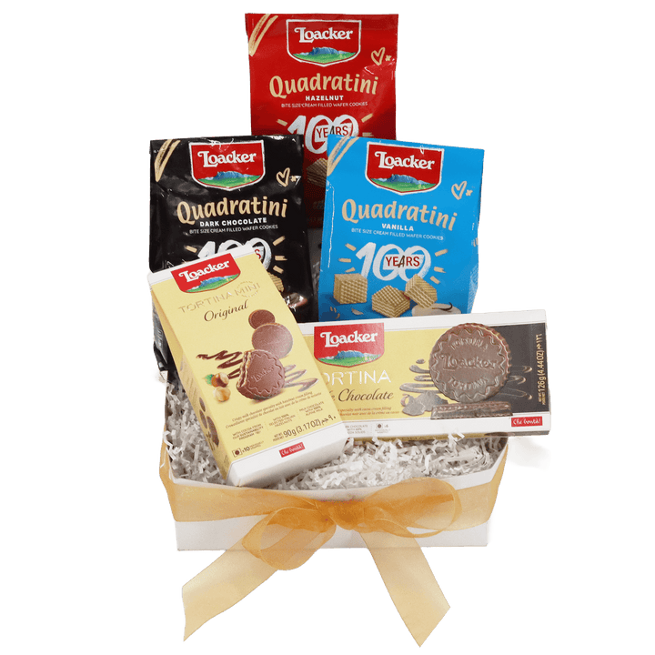 Loacker Quadratini cookies in various flavors arranged in a decorative box called A Taste of Best Sellers Gift Box