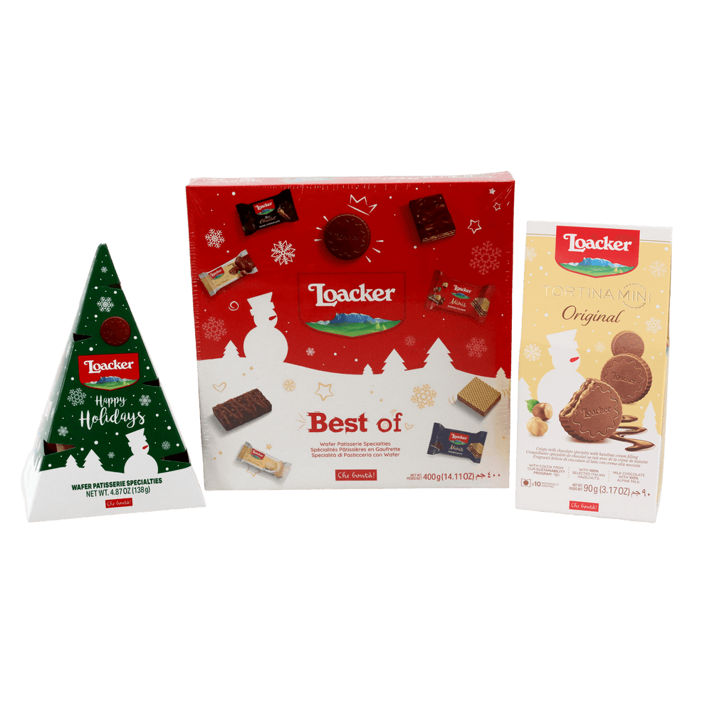 Loacker cookie packaging including a red holiday box, green tree-shaped box, and white packaging with cookies called A Taste of the Holiday Gift Box